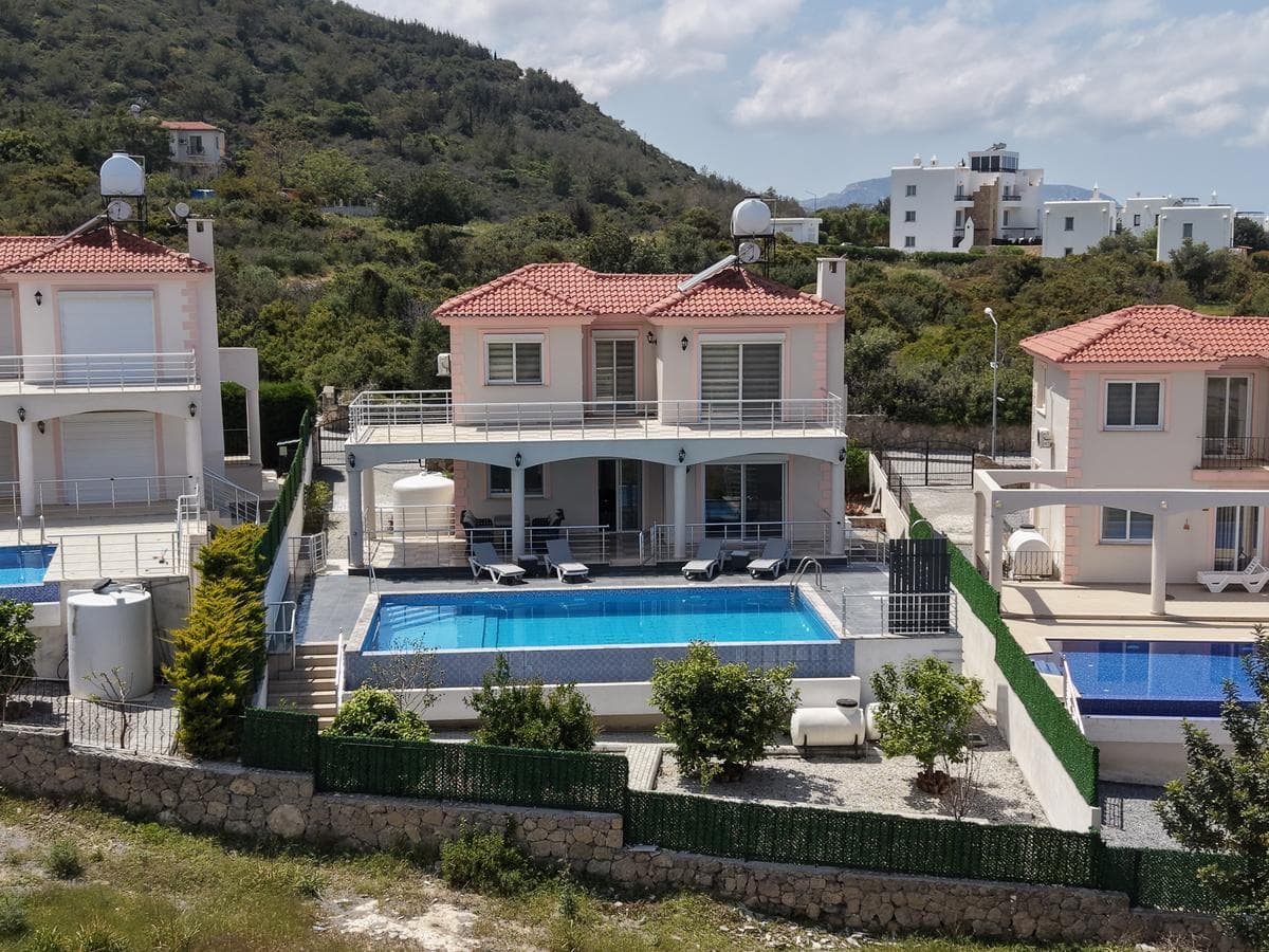 Villa with pool and mountain backdrop